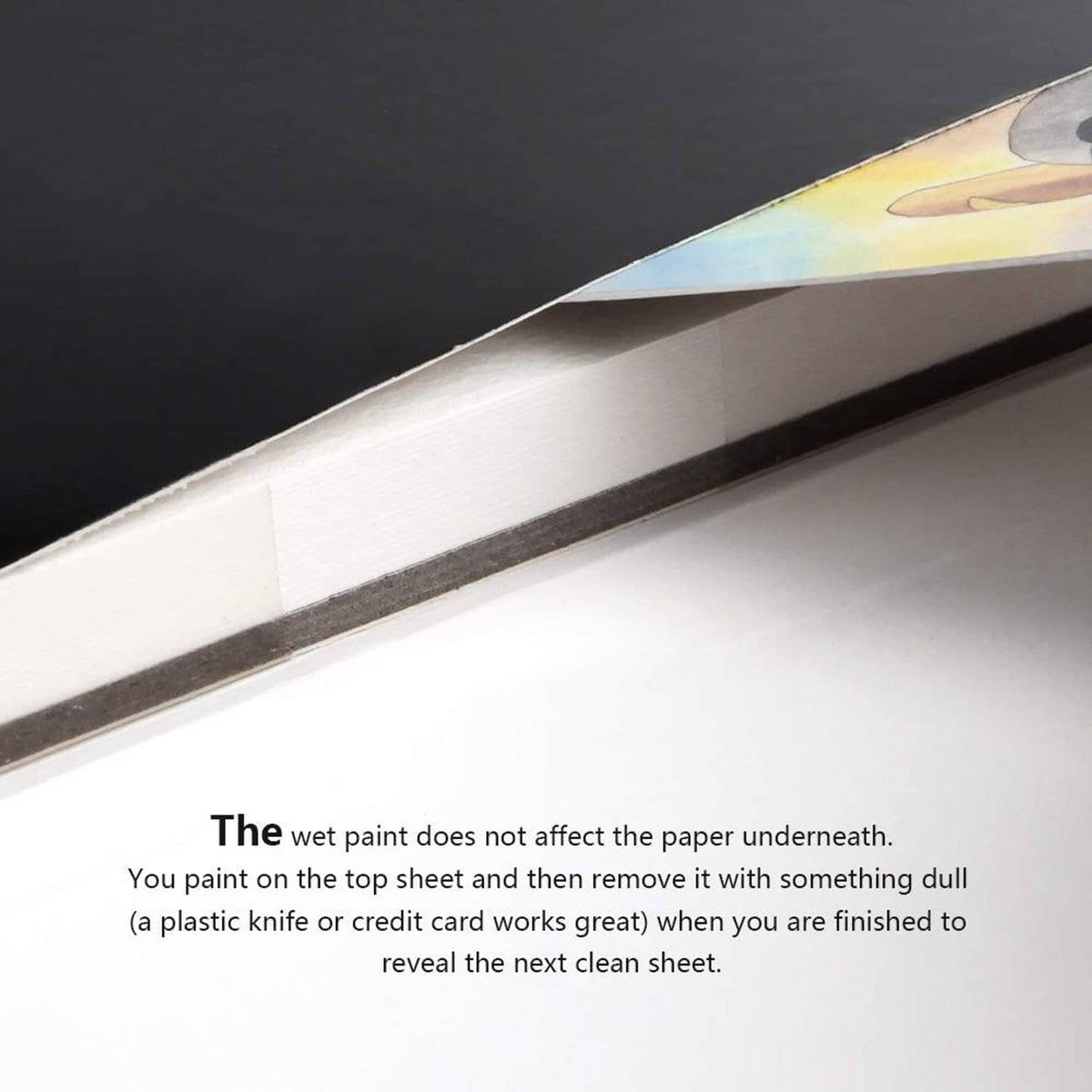 Watercolor paper pad edge showing overlapping sheets