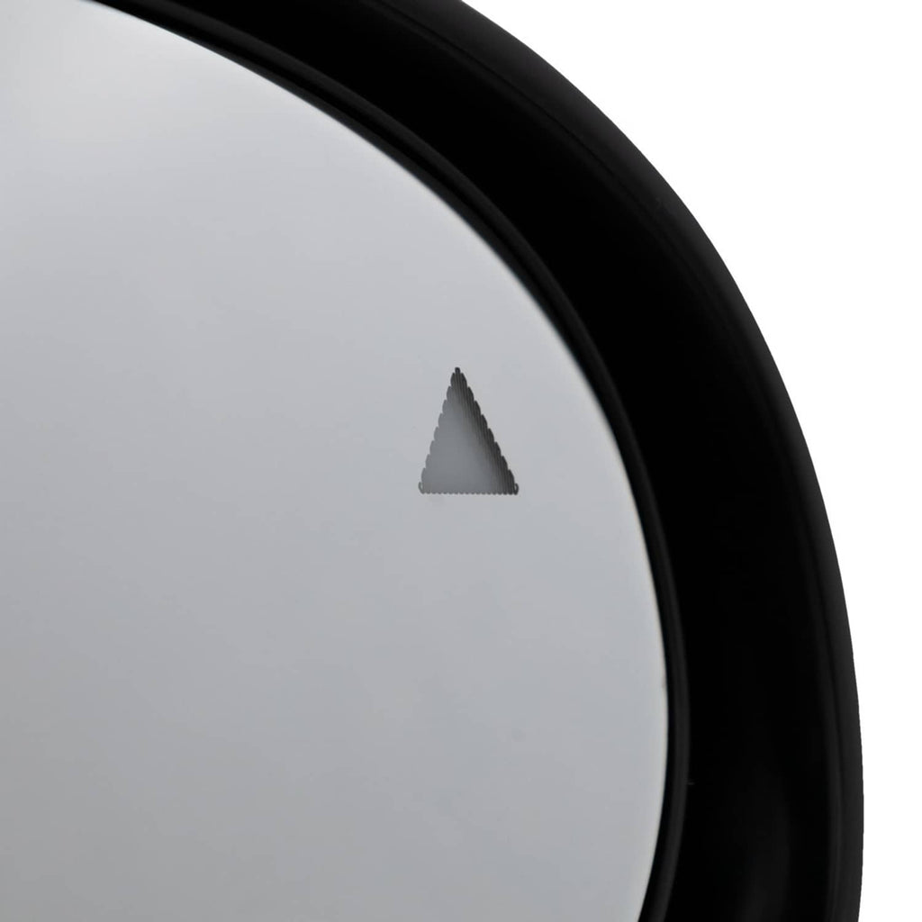 Side mirror glass corner with small triangular warning indicator