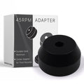 45 RPM adapter box and black center adapter for 7-inch records, solid aluminum disc