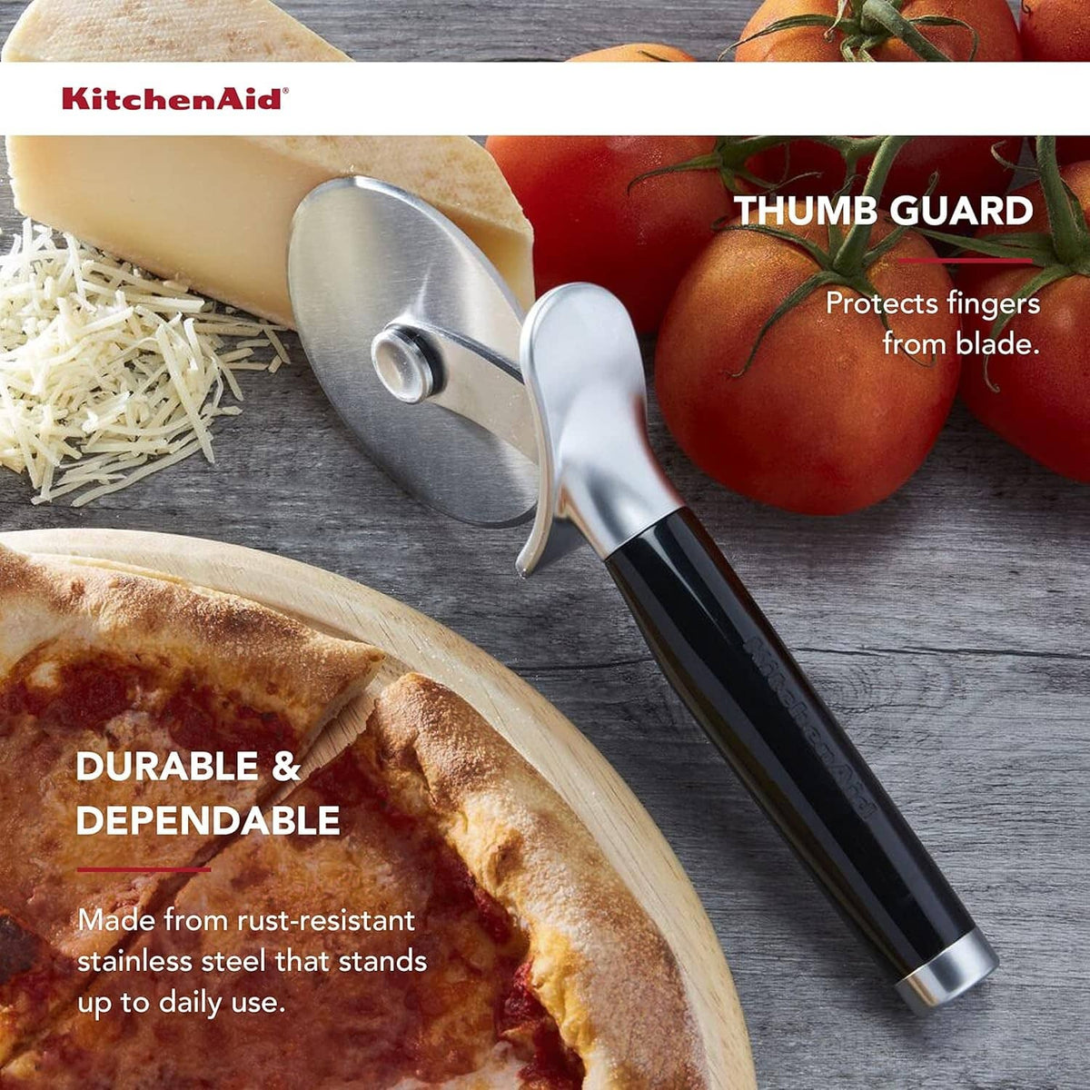 Black-handled pizza wheel cutter with stainless thumb guard above pizza