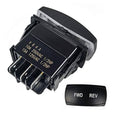 Forward/reverse switch assembly with FWD and REV labels and electrical terminal blocks