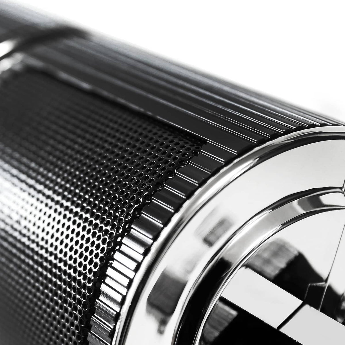 Close-up of black speaker grille and chrome ring on a cylindrical waterproof housing