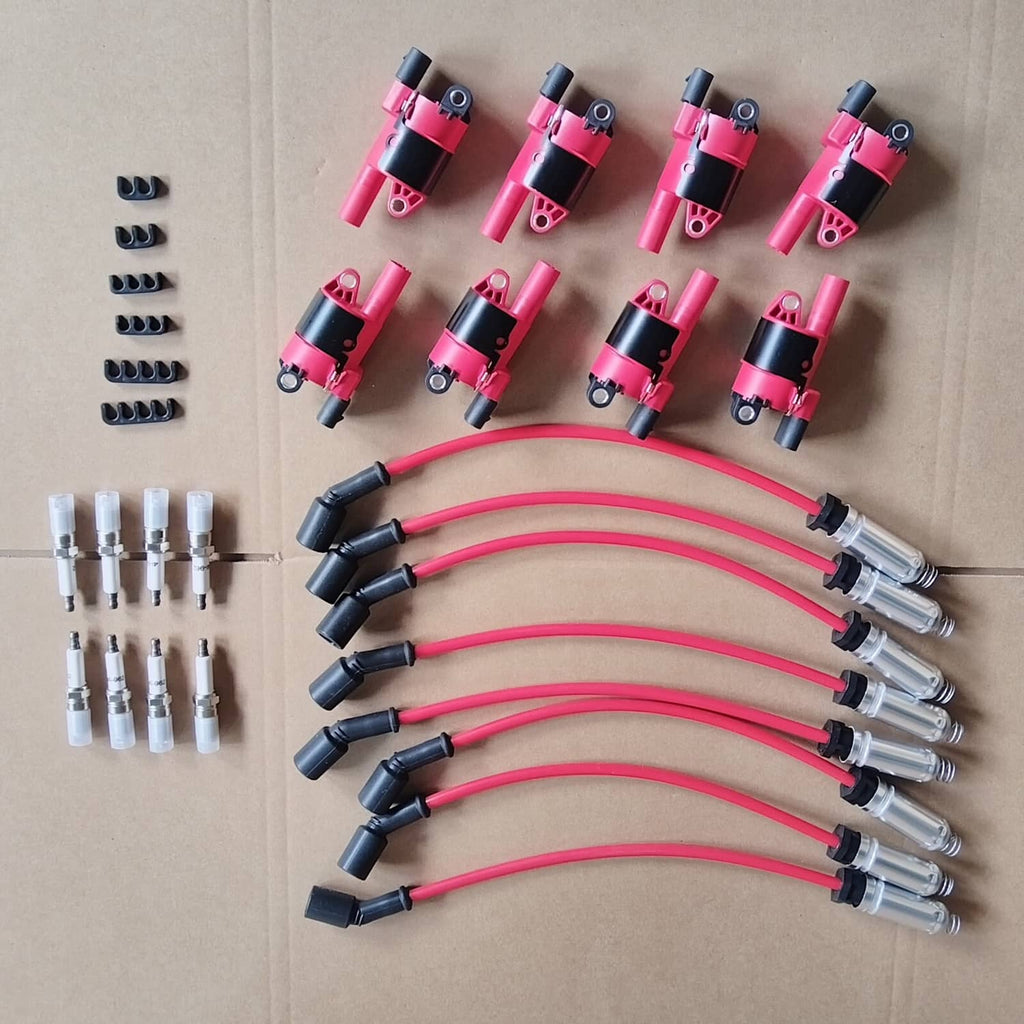 Ignition coil and spark plug wire kit with pink coil packs and connectors