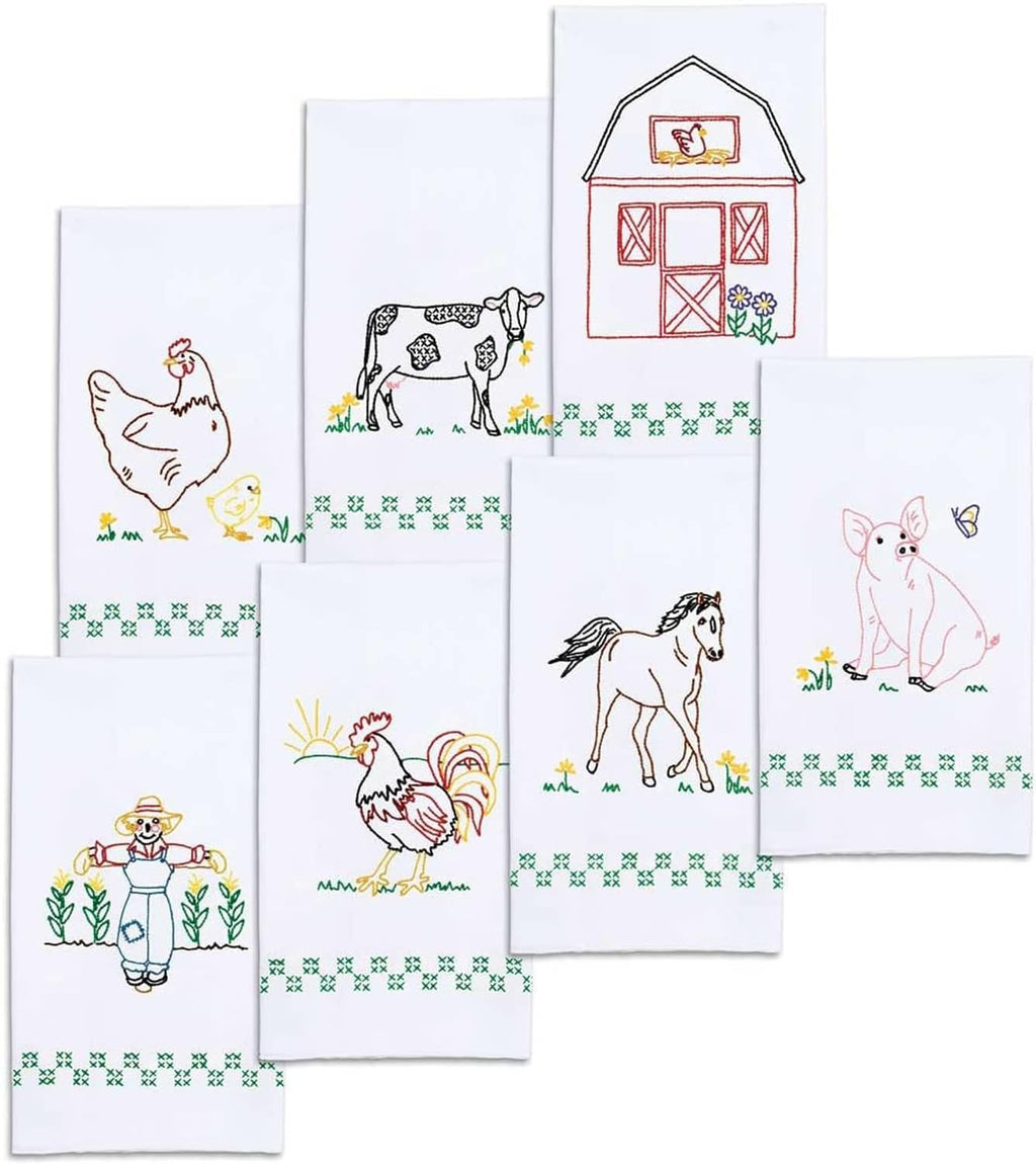 White hand towels with colorful farm embroidery: barn, cow, chicken, rabbit, and sheep