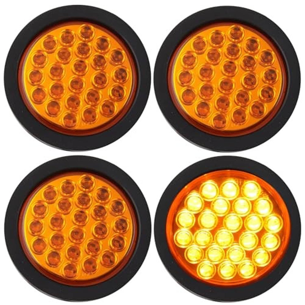 Four round amber LED trailer strobe lights, black bezels, two shown lit