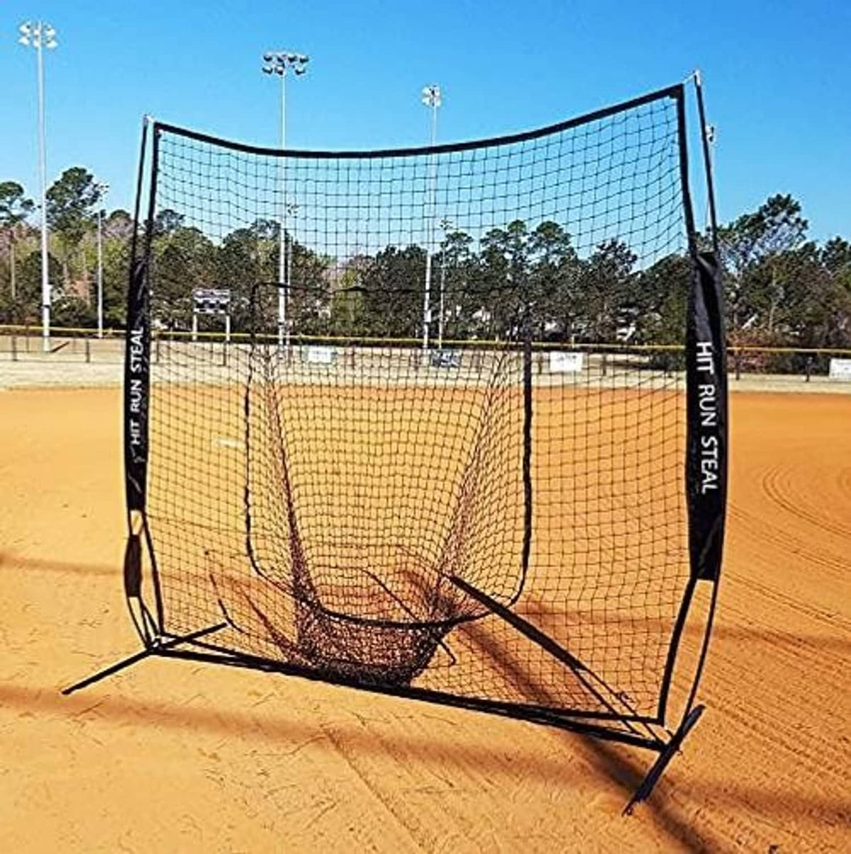 Outdoor baseball practice net with black frame and dark mesh front target pocket