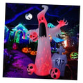12 ft Halloween ghost inflatable with red skull face, glowing body, and RIP tombstones