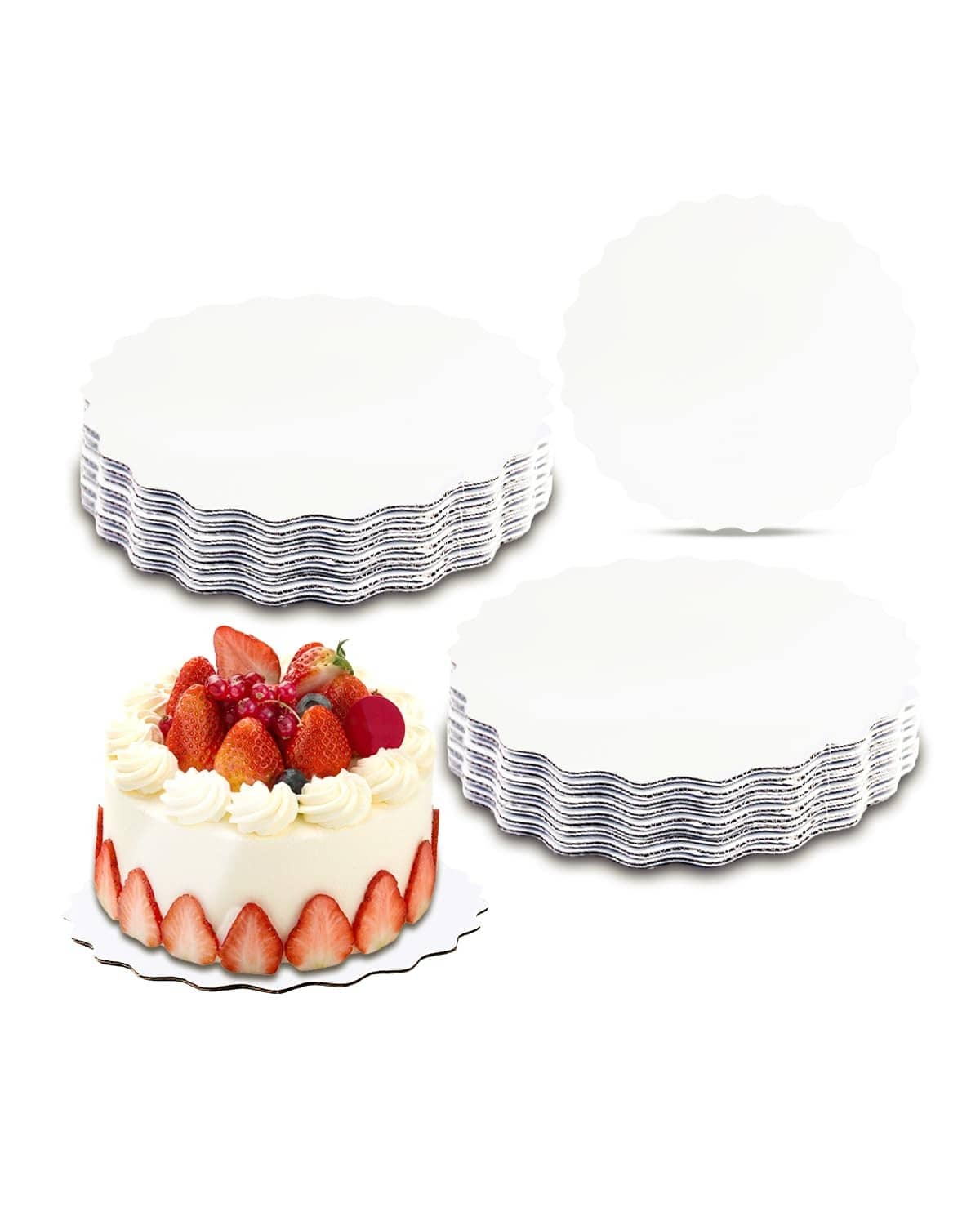 White round wave cake boards with scalloped edges, stacked beside a cake