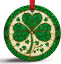 Round green ceramic shamrock ornament with red hanging ribbon and clover tree design