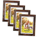 Rustic brown wood picture frame set with white mat and 5x7 photo inserts, four pack
