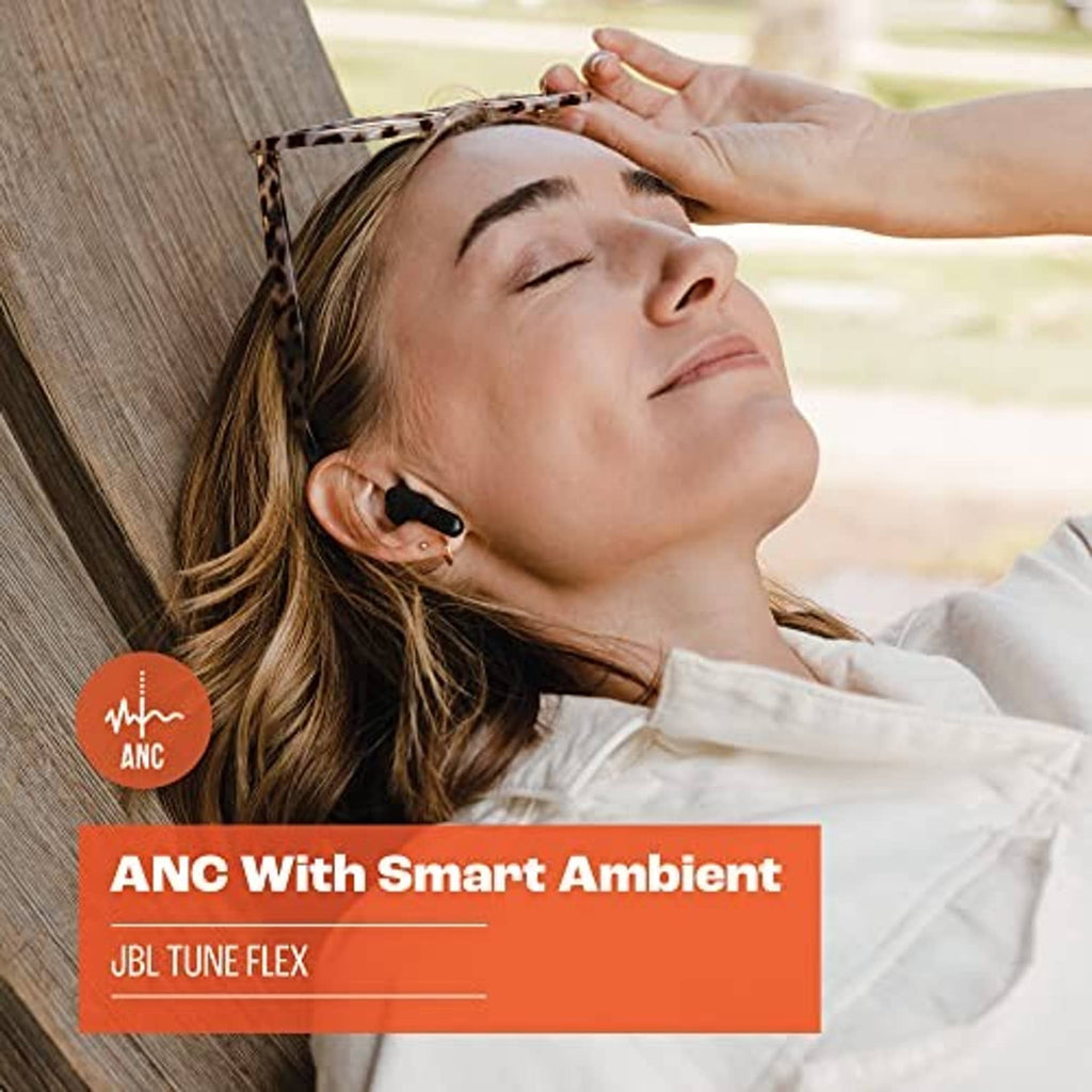 Black JBL true wireless earbuds in ear, close portrait view