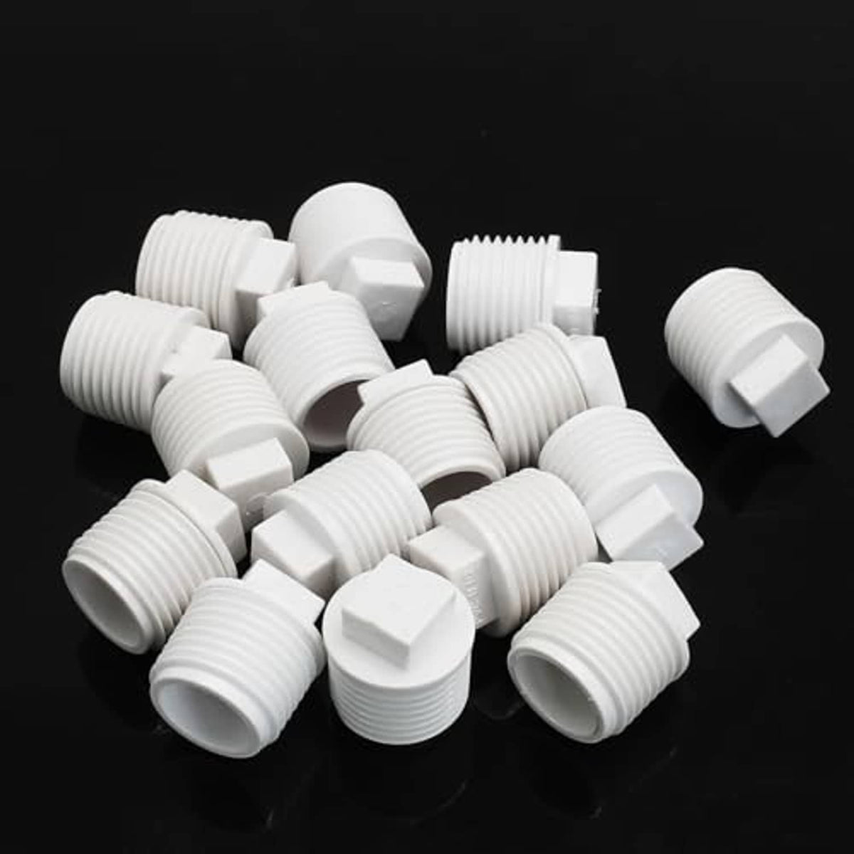 20-pack of white PVC male threaded end cap plugs, 1/2 inch, ribbed threaded finish