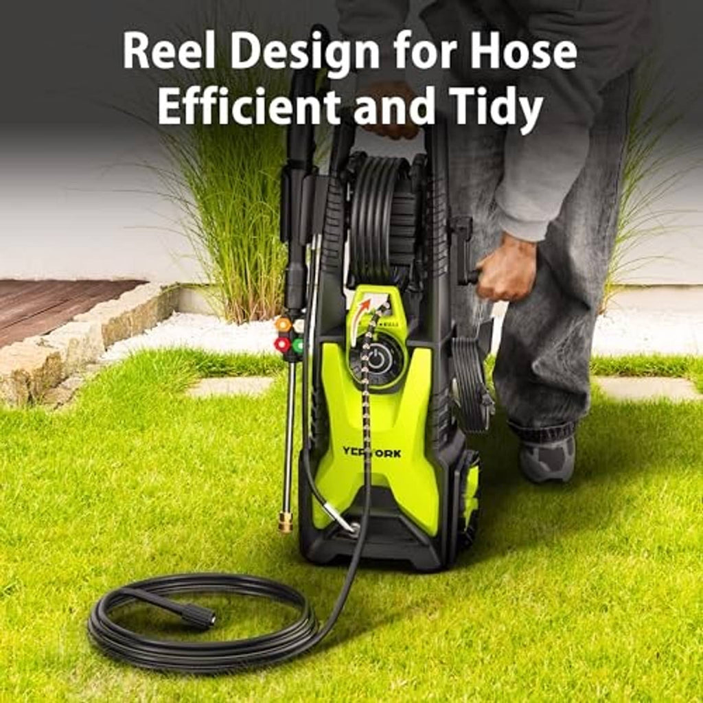 Lime green electric pressure washer on grass with connected hose and spray wand