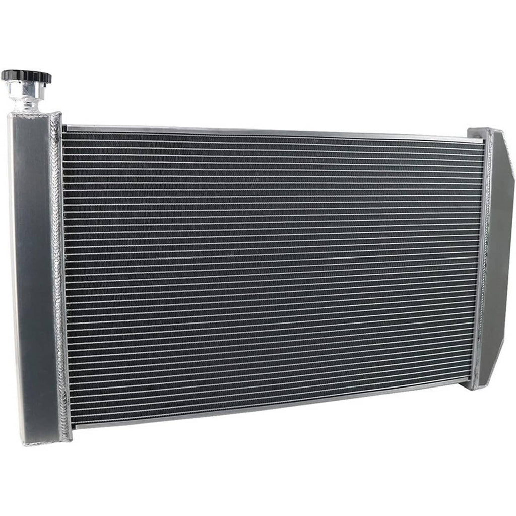 Close view of 3-row radiator core with silver end tanks and cooling fin rows
