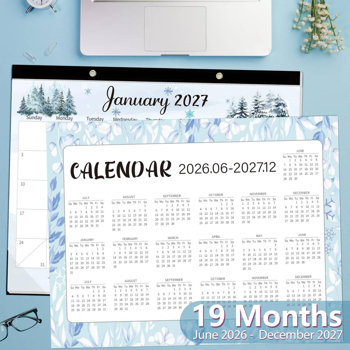 Large desk calendar layout showing January 2027 with blue leaf theme and 19 months