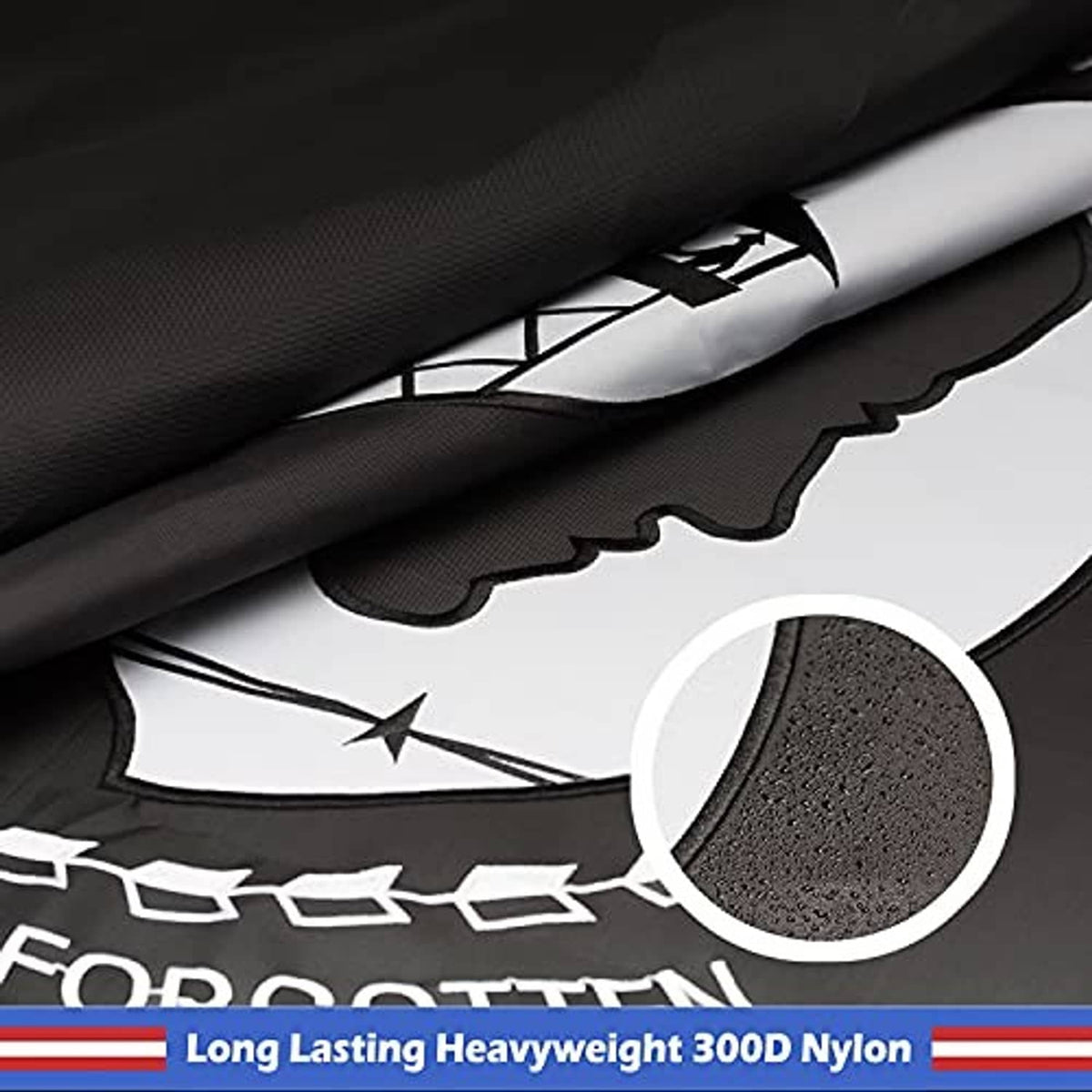 Embroidered POW-MIA flag hem close-up with scalloped edge stitching