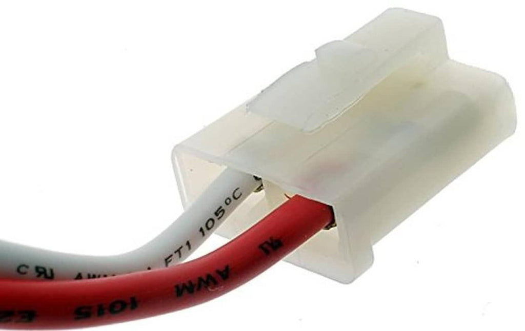 Alternator connector plug with red wire showing printed text; white housing