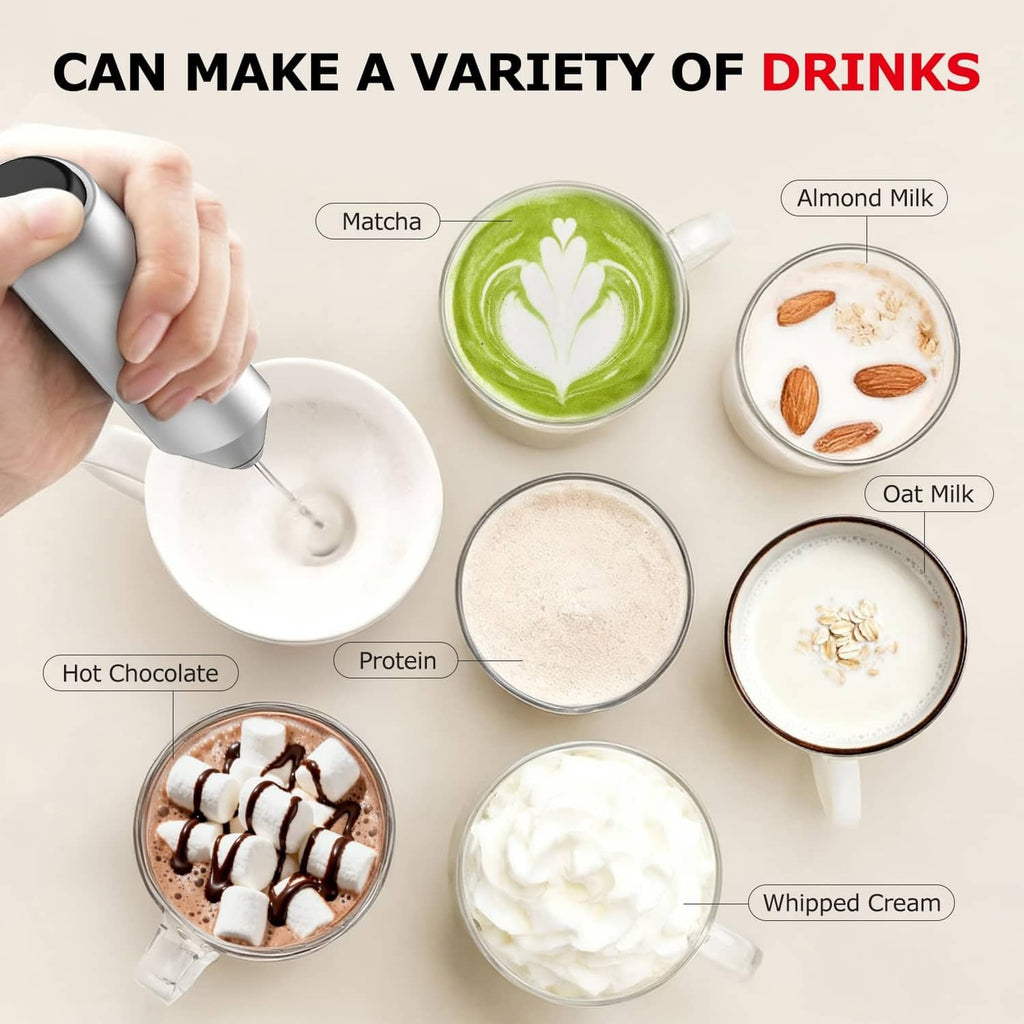 Silver milk frother dispensing foam beside several drink cups