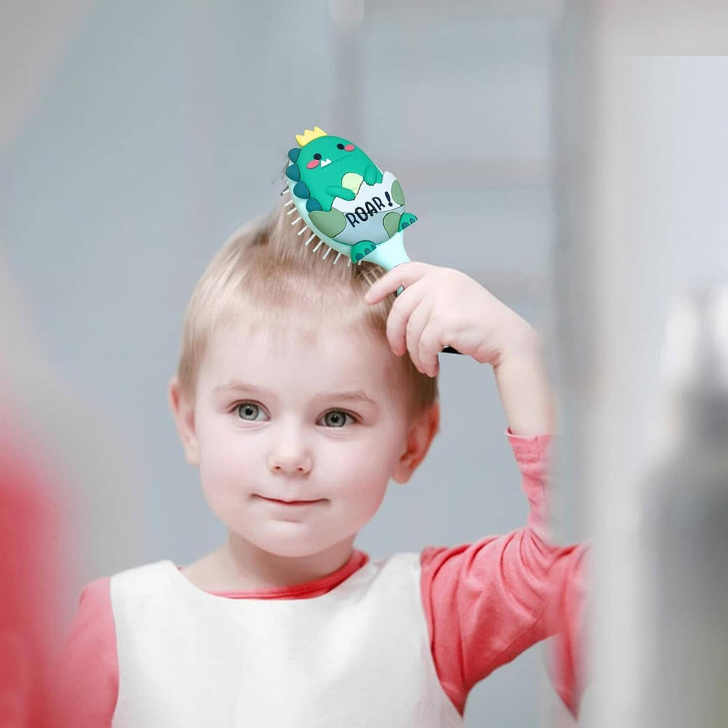 Child brushing hair with a mint oval brush featuring a green dinosaur head on top
