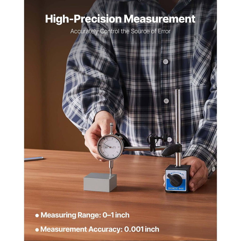 Dial test indicator on magnetic base with round gauge dial and metal stem