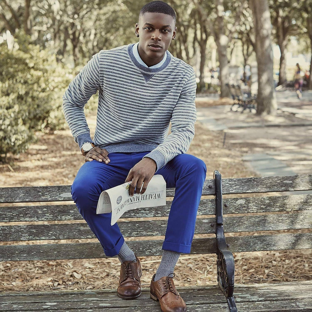 Black crew socks worn with blue pants, casual knit texture visible
