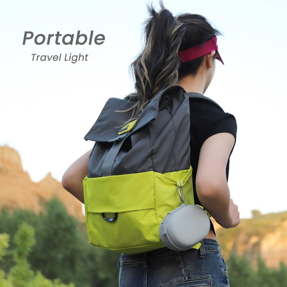 Gray foldable urinal device storage case carried in a travel crossbody bag