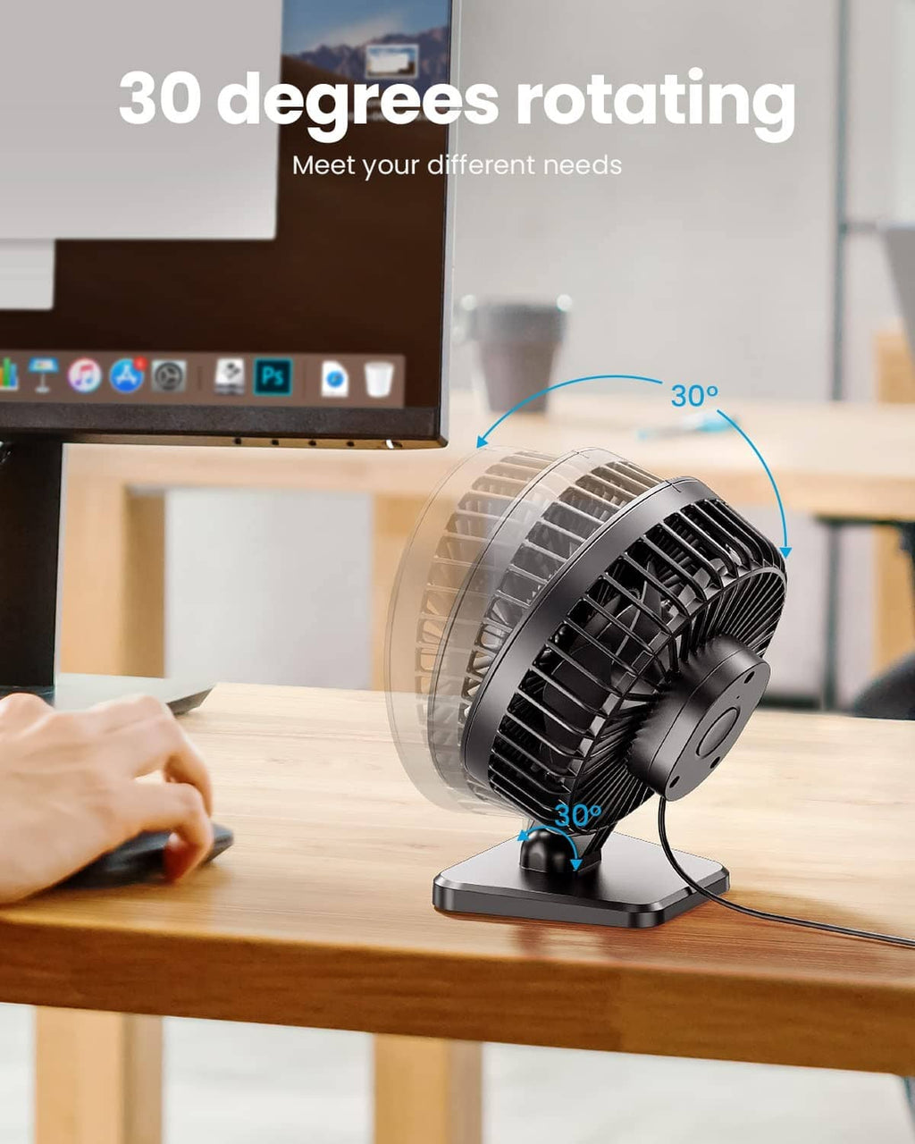 Black USB desk fan on desk showing rotating airflow angles toward the left