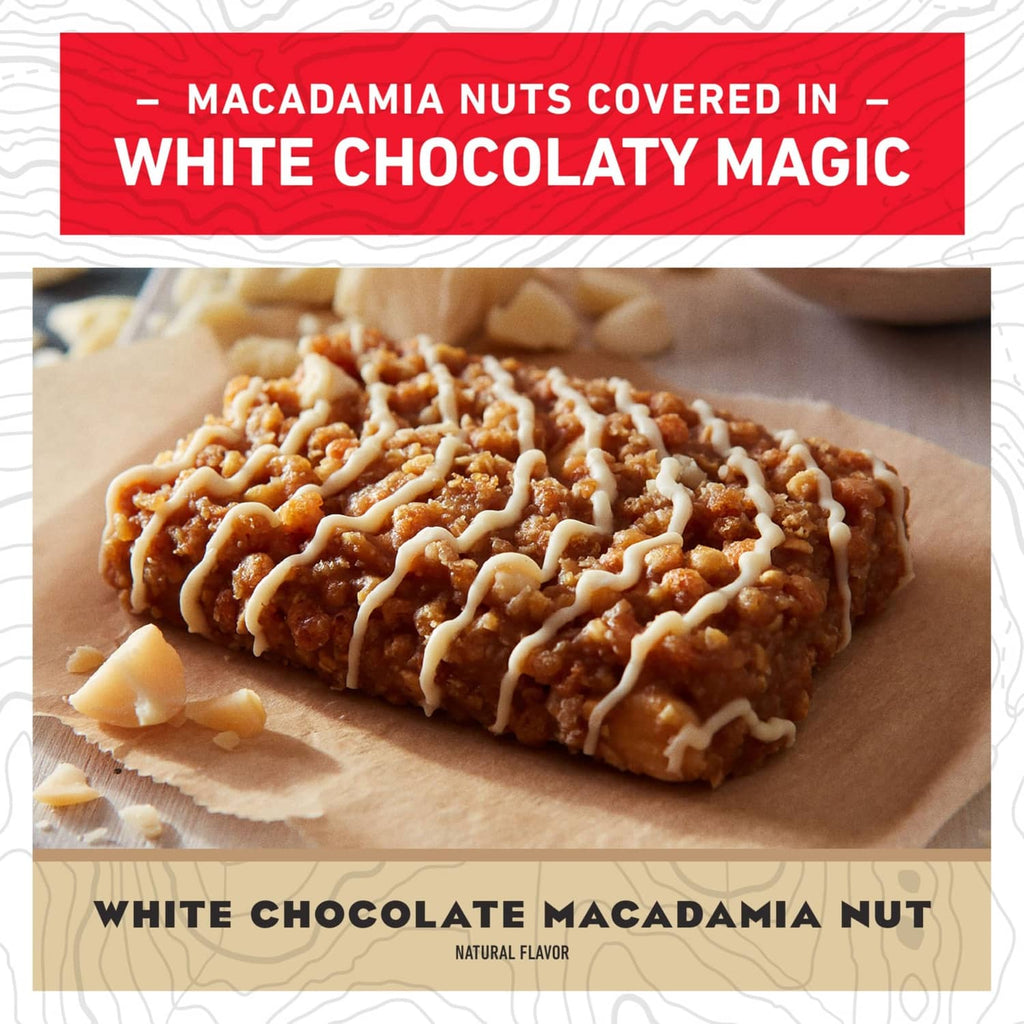 White chocolate macadamia energy bar with drizzle on parchment