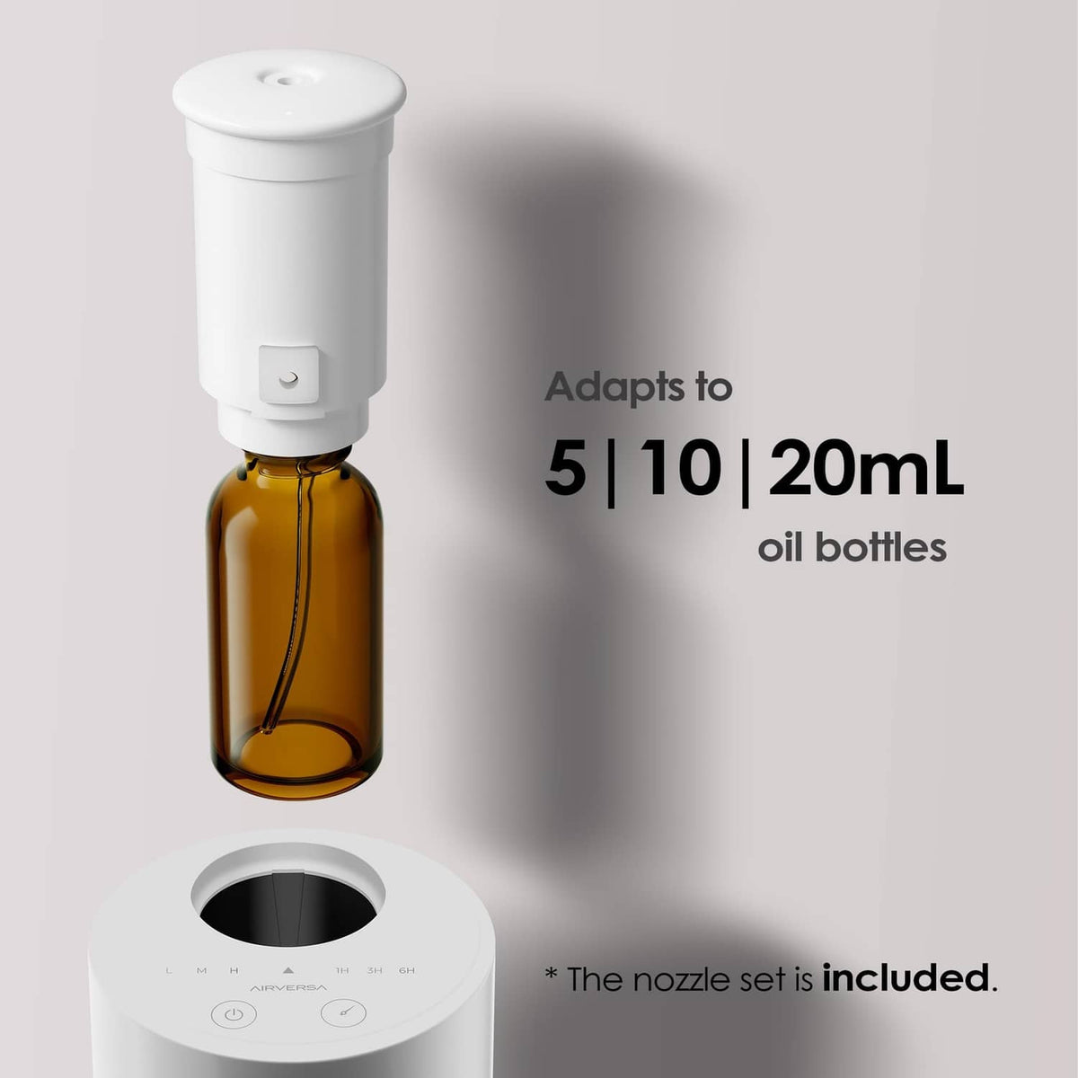 Waterless essential oil diffuser with amber oil bottle and base, white top and nozzle