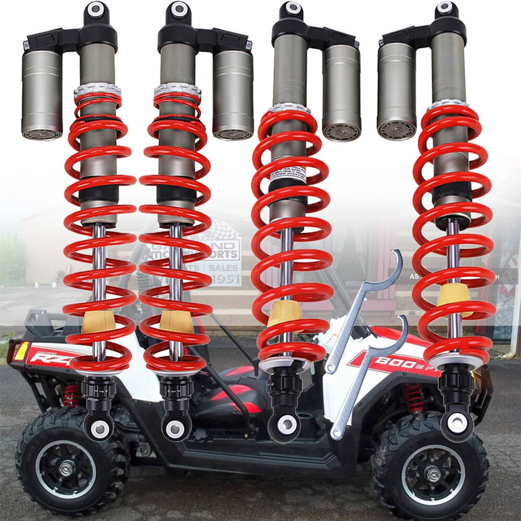 Set of four adjustable shock absorbers with red springs and silver bodies for UTV