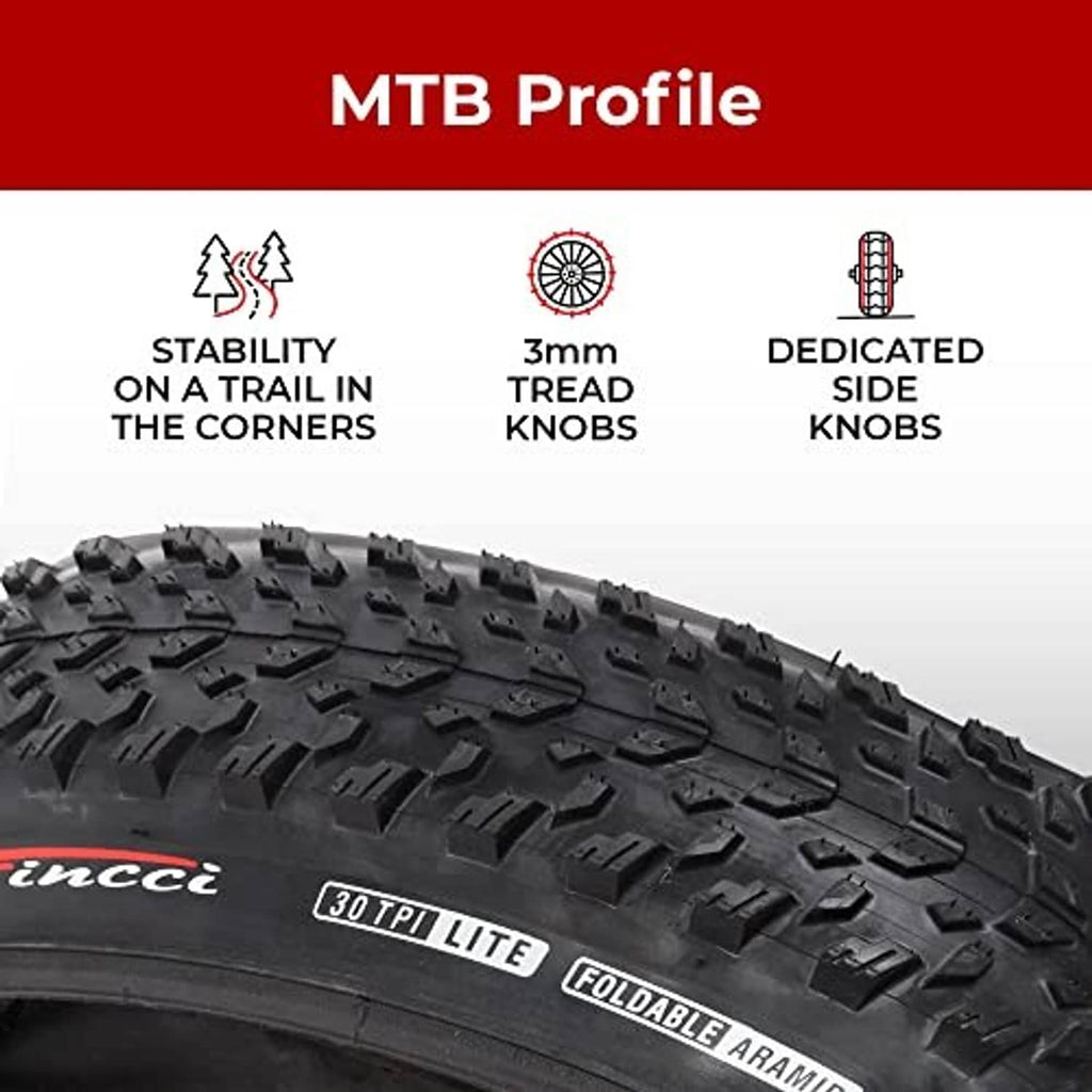 Mountain bike tire with aggressive tread knobs and reinforced sidewall edge