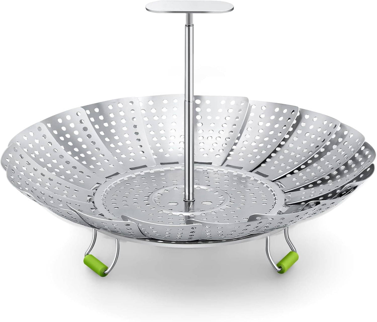 Stainless steel vegetable steamer basket with perforated bowl and green silicone stand