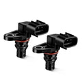Pair of black camshaft position sensors with connector sockets and red seal rings