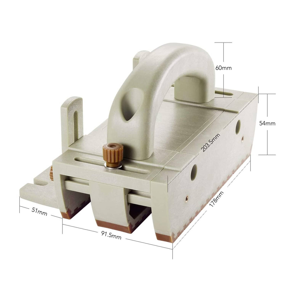 Push block with curved handle and cream body, brown ribbed contact pads on base