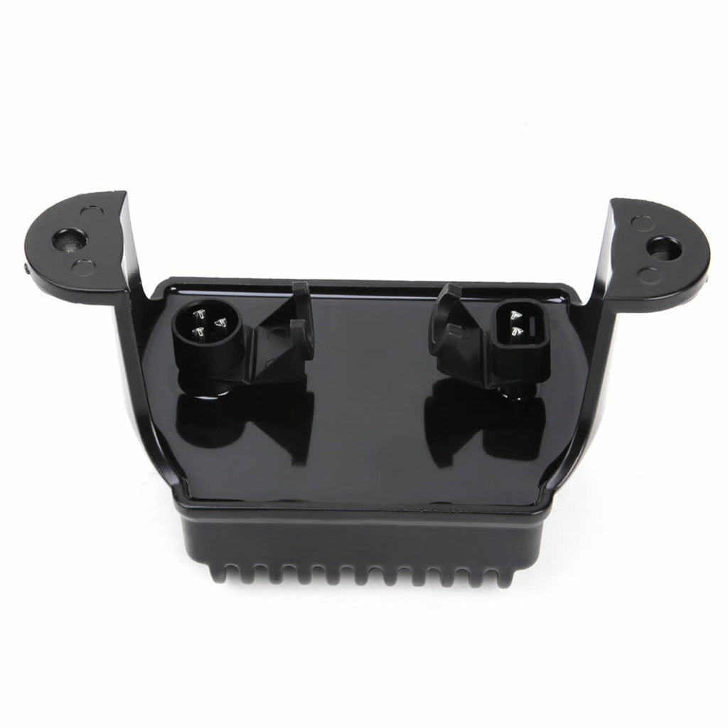 Black voltage regulator rectifier underside with two connector housings and mounting posts