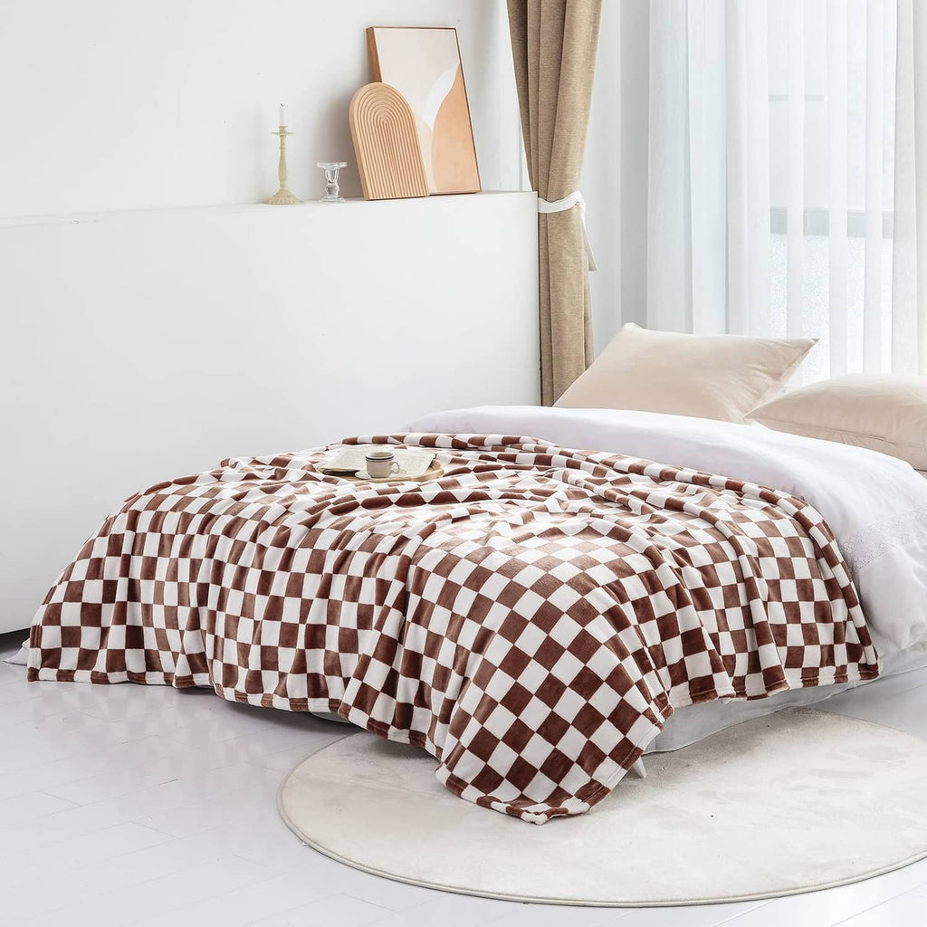 Checkerboard flannel throw blanket with coffee-brown and white pattern, folded