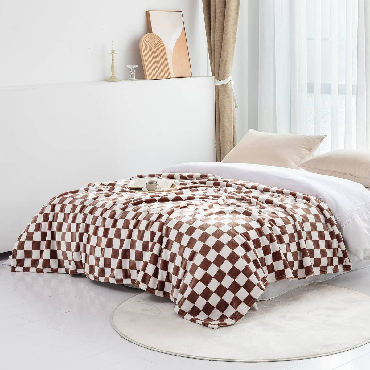 Checkerboard flannel throw blanket with coffee-brown and white pattern, folded