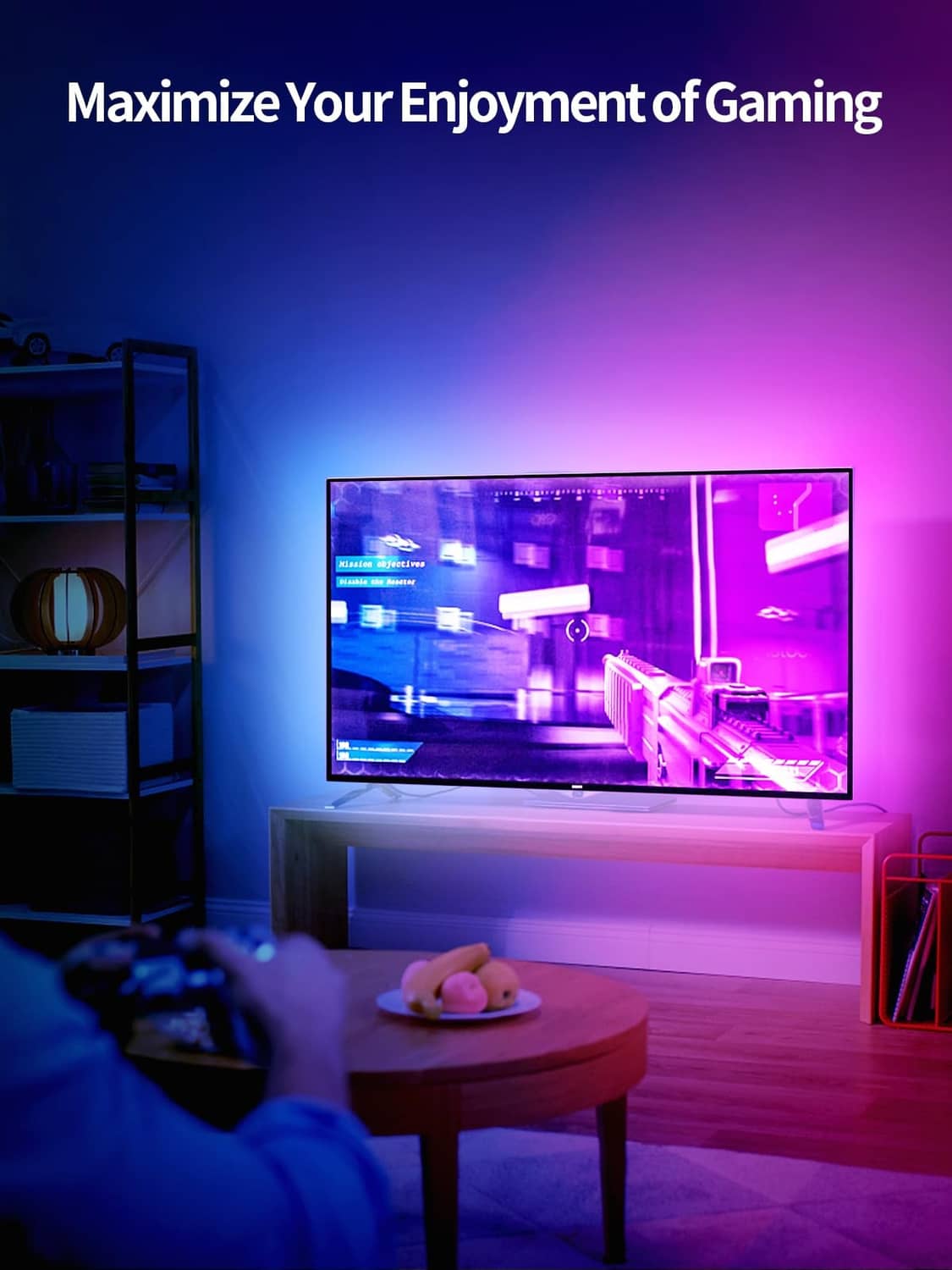 Multicolor LED TV light strip illuminating a gaming TV with RGB glow