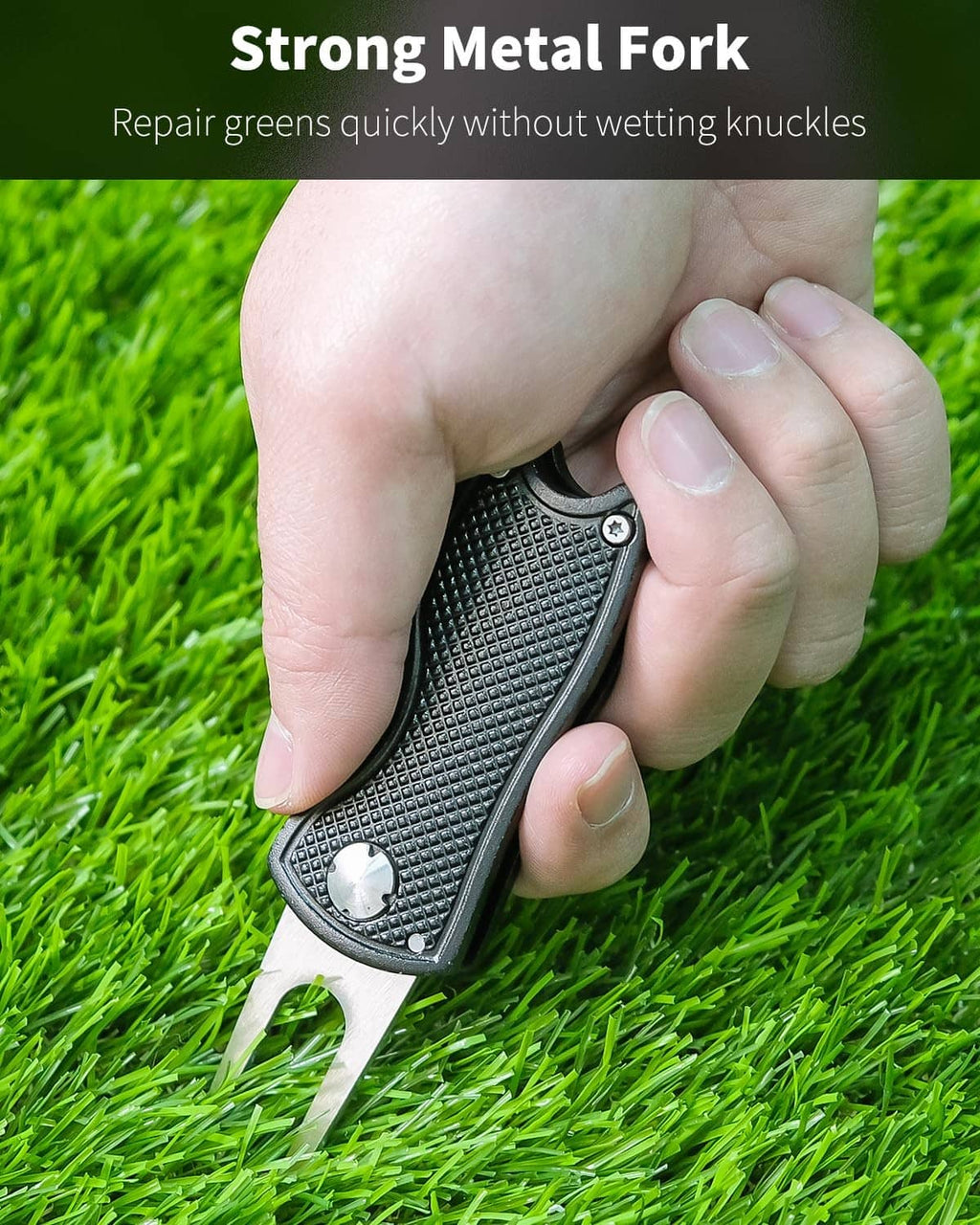 Foldable metal golf divot repair tool held in hand with fork prongs