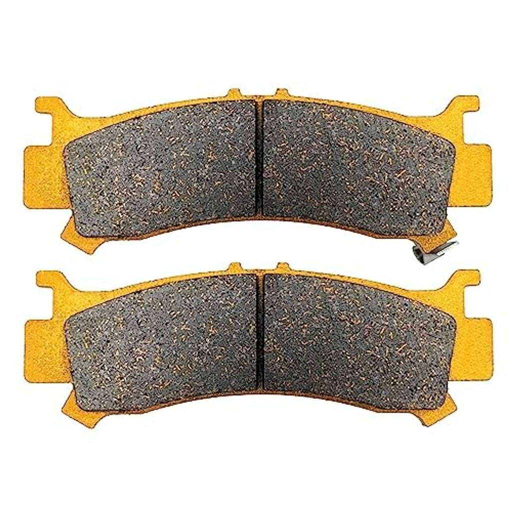 Curved ceramic brake pads, dark gray textured surface on gold backing plates, pair