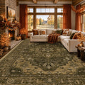 Rectangular area rug with ornate floral medallion pattern in dark olive and brown