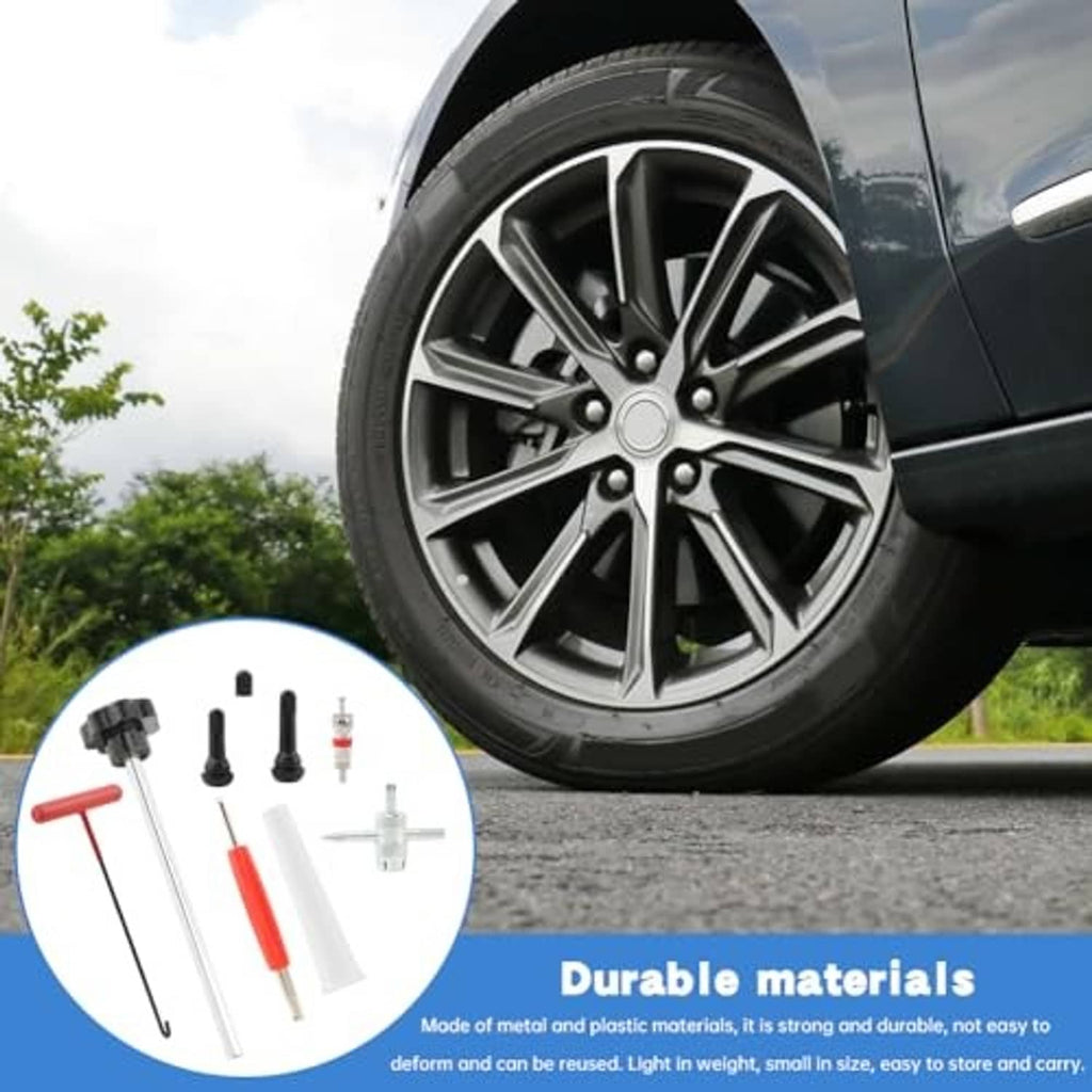 Tire valve stem tool kit with metal tools, red handle, and spare valve parts shown on wheel