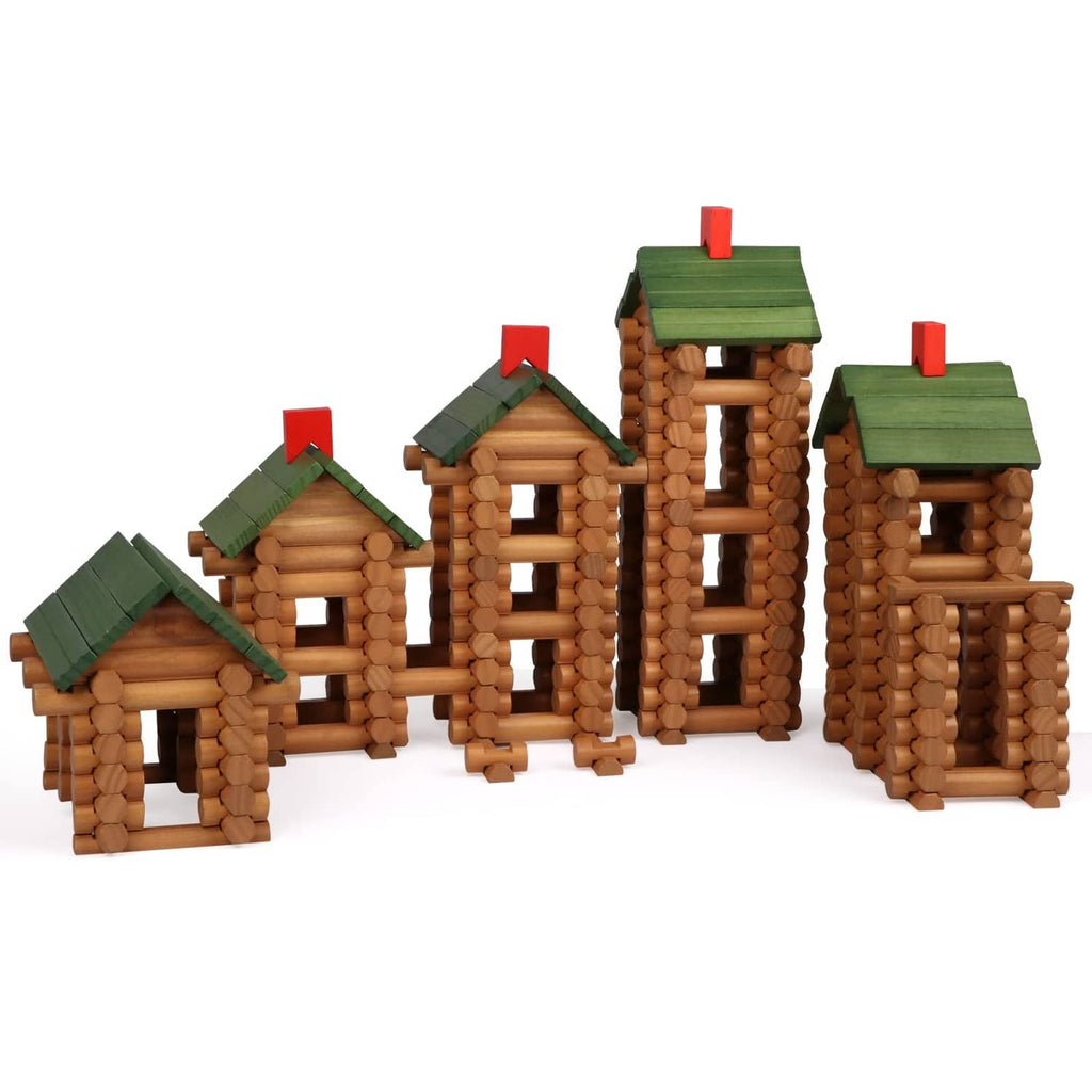 Wooden log building set with four assembled brown log houses and green roofs