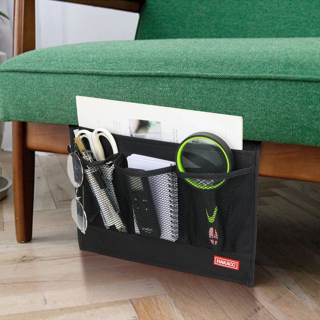 Black bedside storage caddy with mesh pockets and side card holder