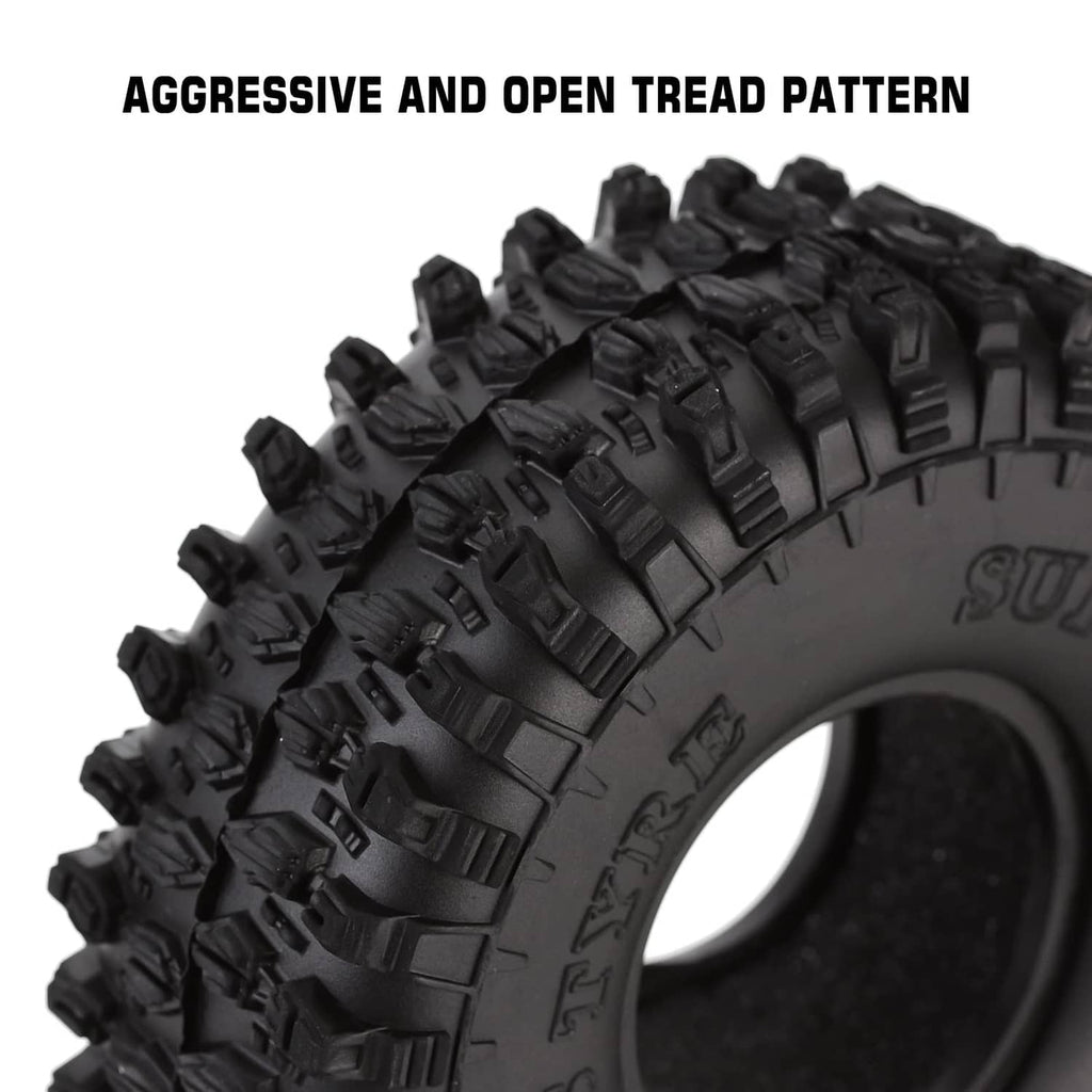 Black tire side with deep open tread blocks and raised traction lugs