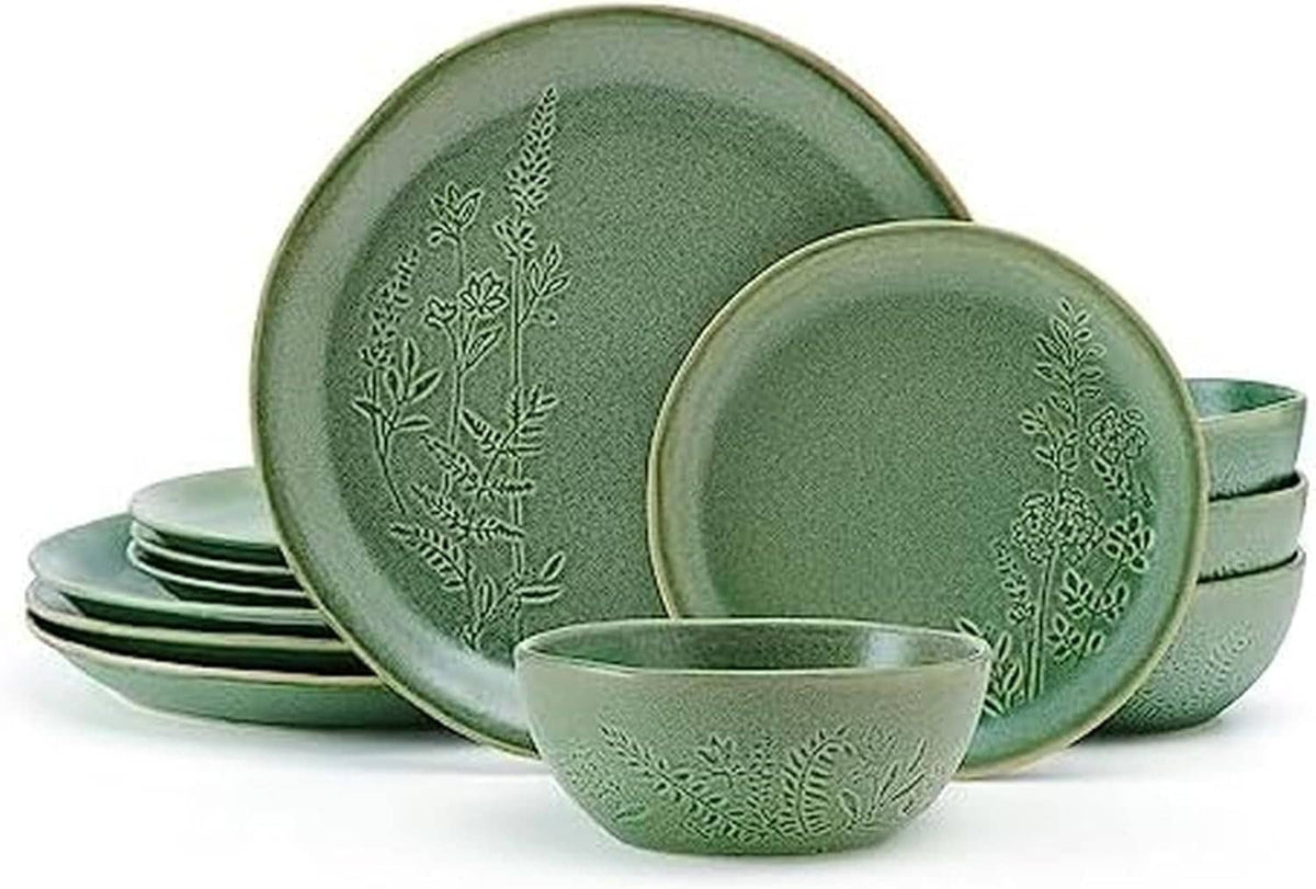 Green ceramic dinnerware set with embossed floral pattern; plates and bowls for serving