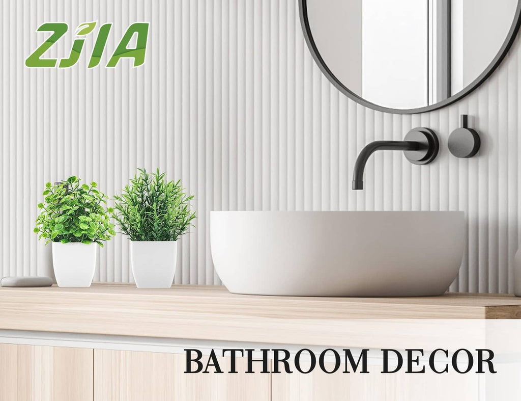 ZJIA 2-pack artificial plants: two small green plants in white pots on shelf.