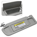 Light gray left driver-side car sun visor with air bag warning label