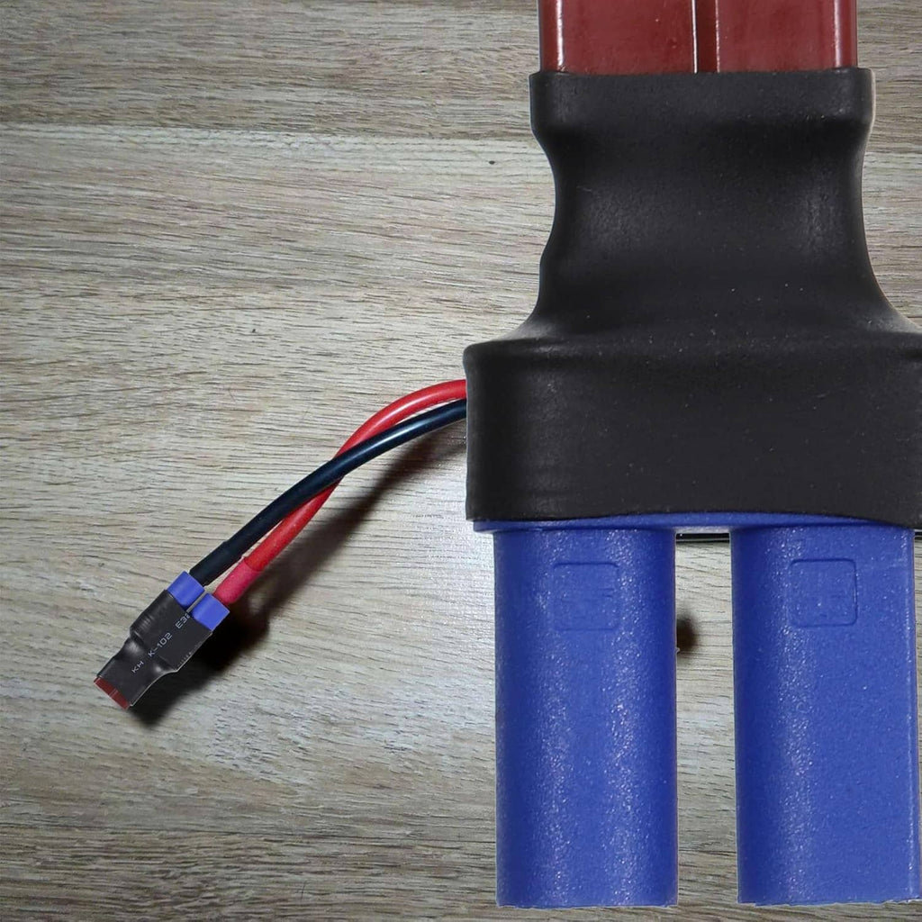 Black and blue EC5 adapter plug with red/blue wires and metal contact openings