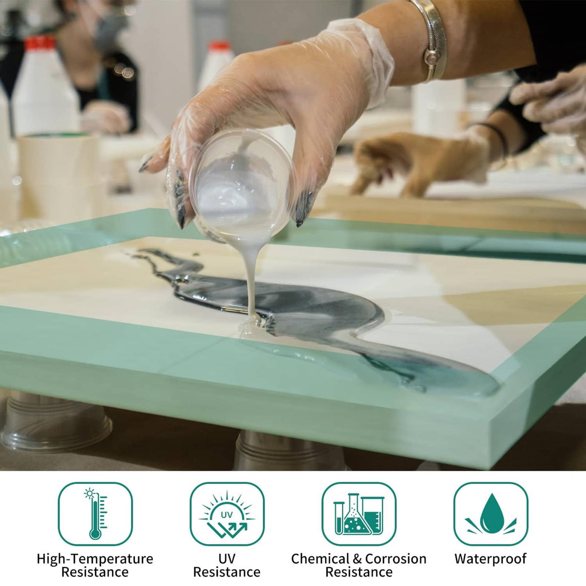 Green epoxy molding tape strips masking a mold while resin is poured